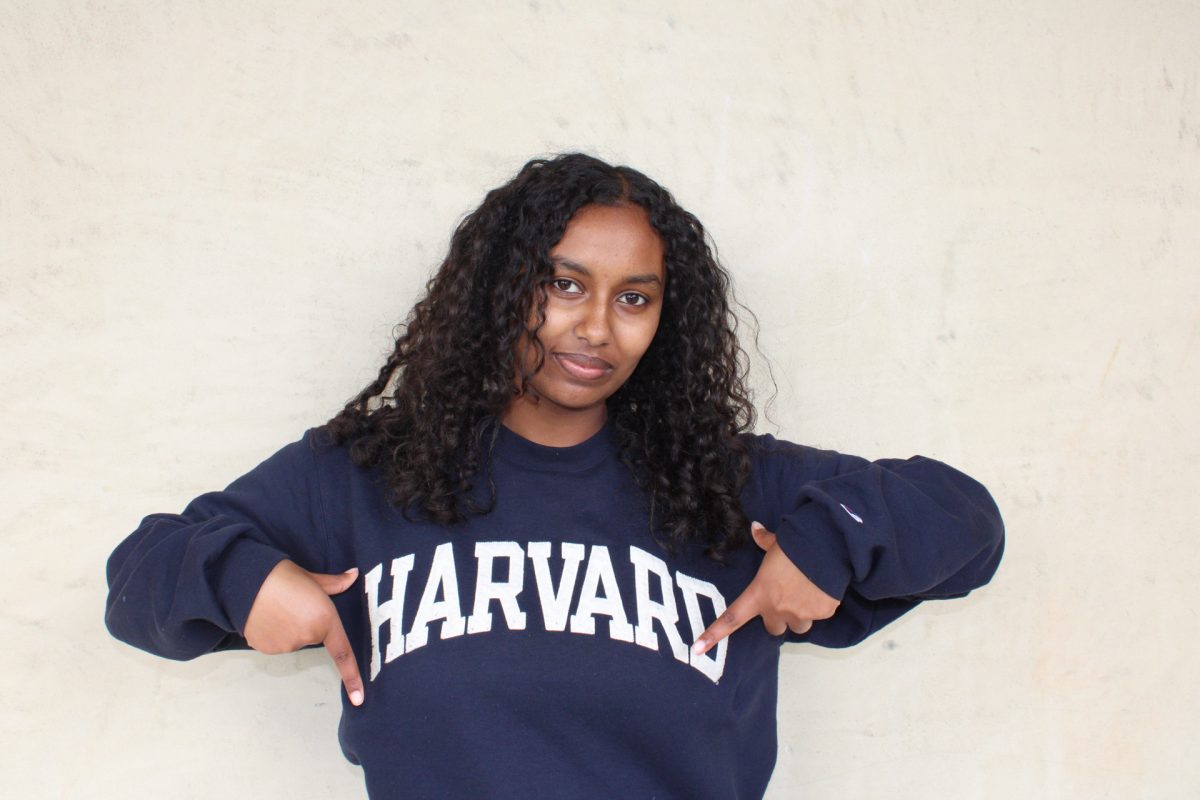 Heaven Woldai (24) celebrates her acceptance to Harvard University.