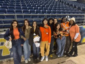 Seniors demonstrating spirit at the soccer stadium 