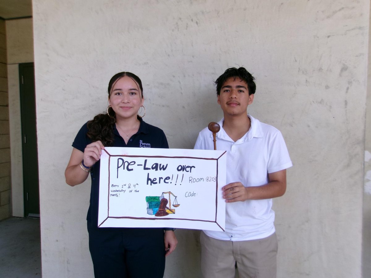 President Julius Molina and Vice-President Allison Solis recruiting new members for the new Pre-Law Society club.