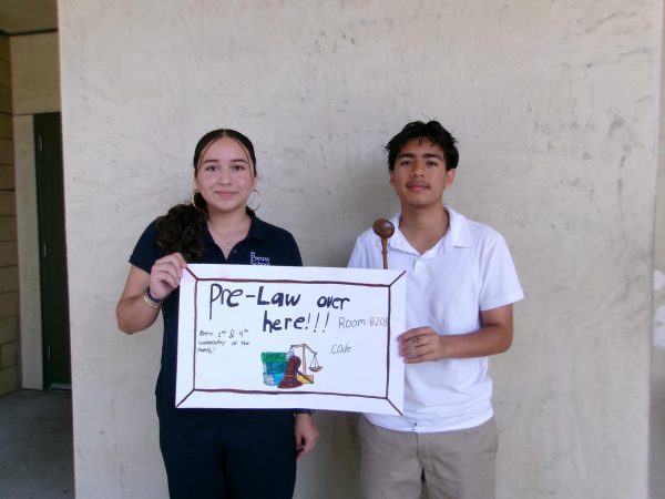 President Julius Molina and Vice-President Allison Solis recruiting new members for the new Pre-Law Society club.