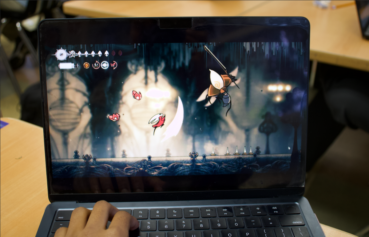 Student Playing Silksong
