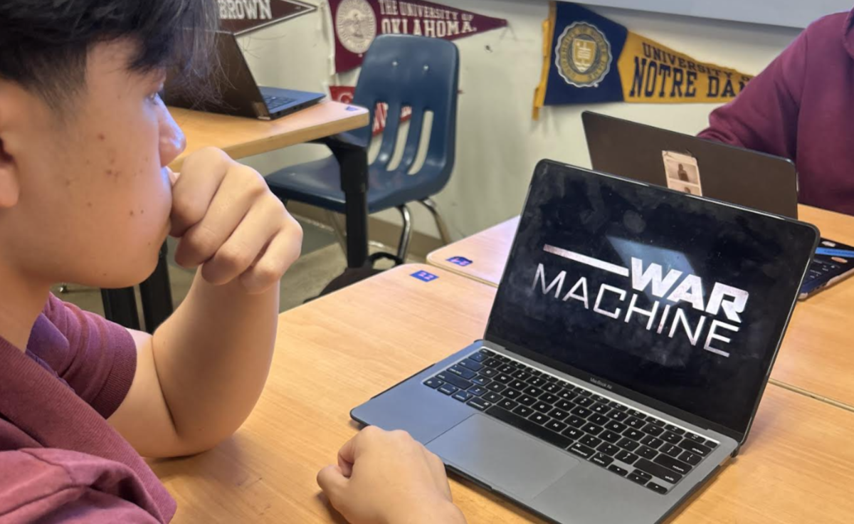 Student watching War Machine