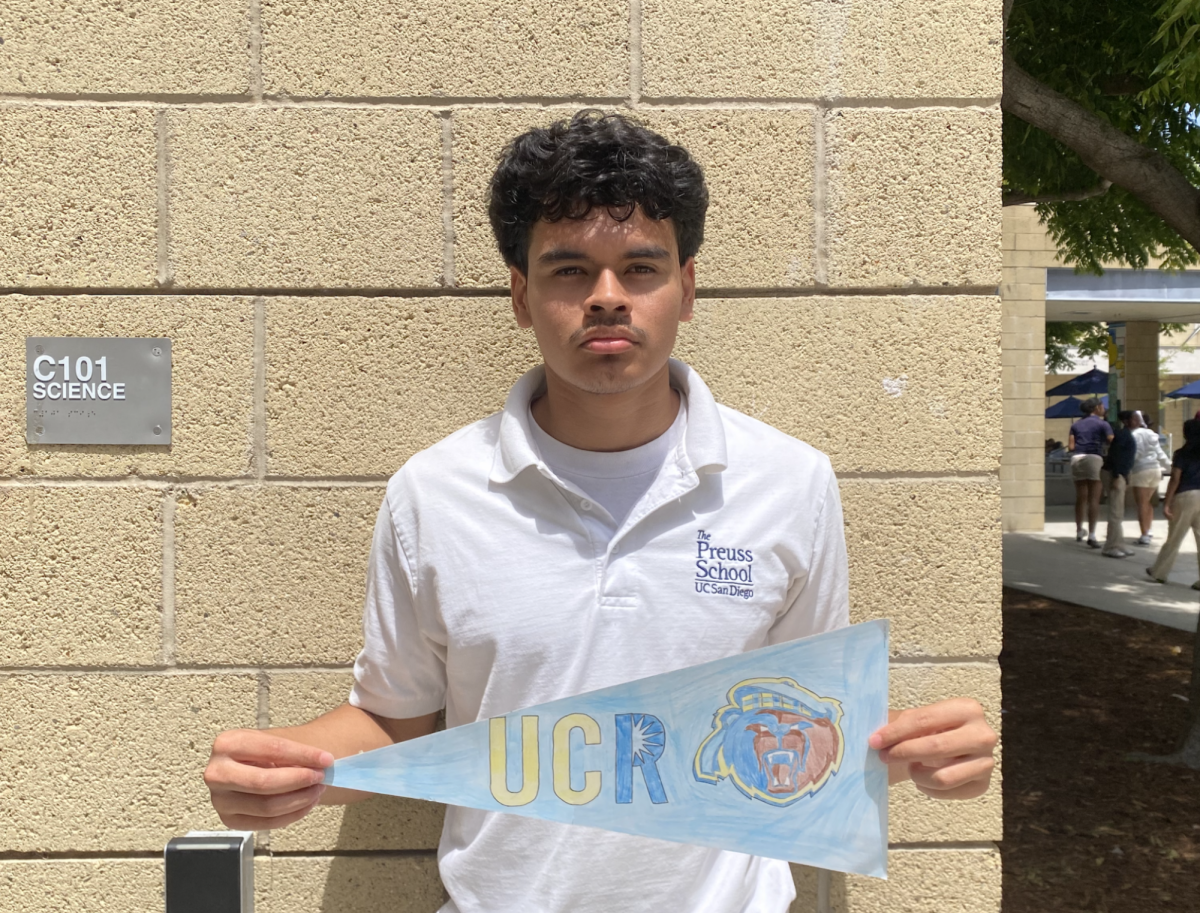 Pedro Lugo-Porres with a UC Riverside Pennant which is the school he is attending in Fall of 2026