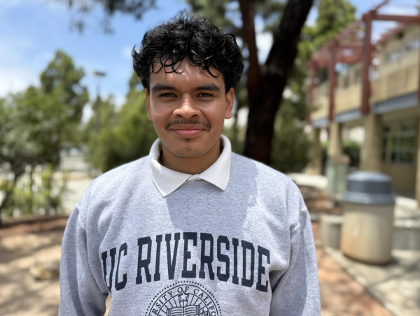 Pedro Lugo-Porres with a UC Riverside hoodie which is the school he is attending in the Fall of 2026